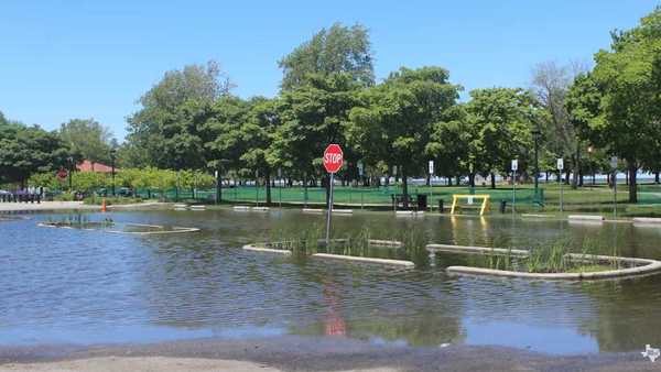 A parking lot with water standing in it from not draining correctly